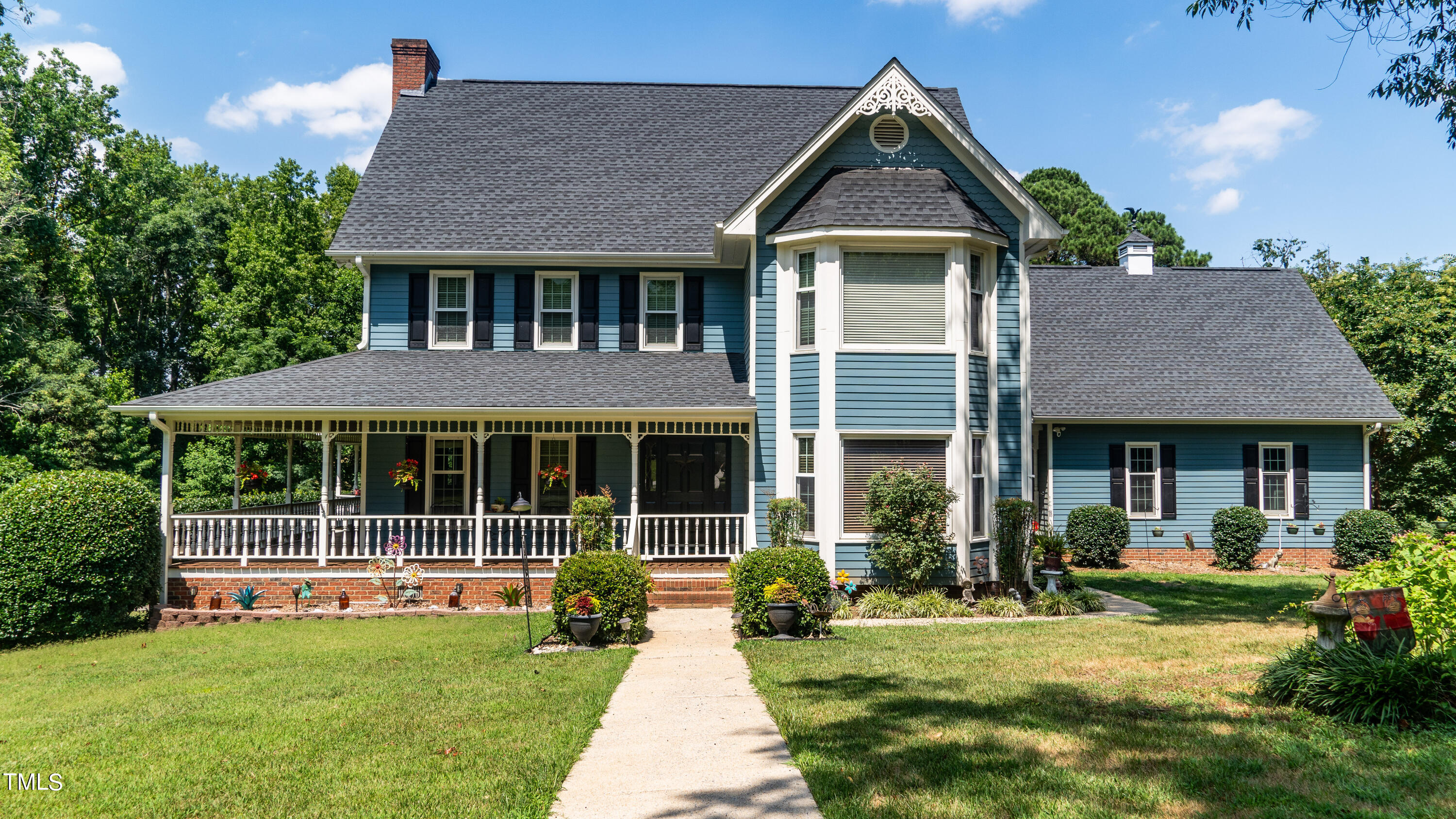 928 Windrow Lane Raleigh, NC 27603 - Photo 2 of 47 front view of a house with a yard