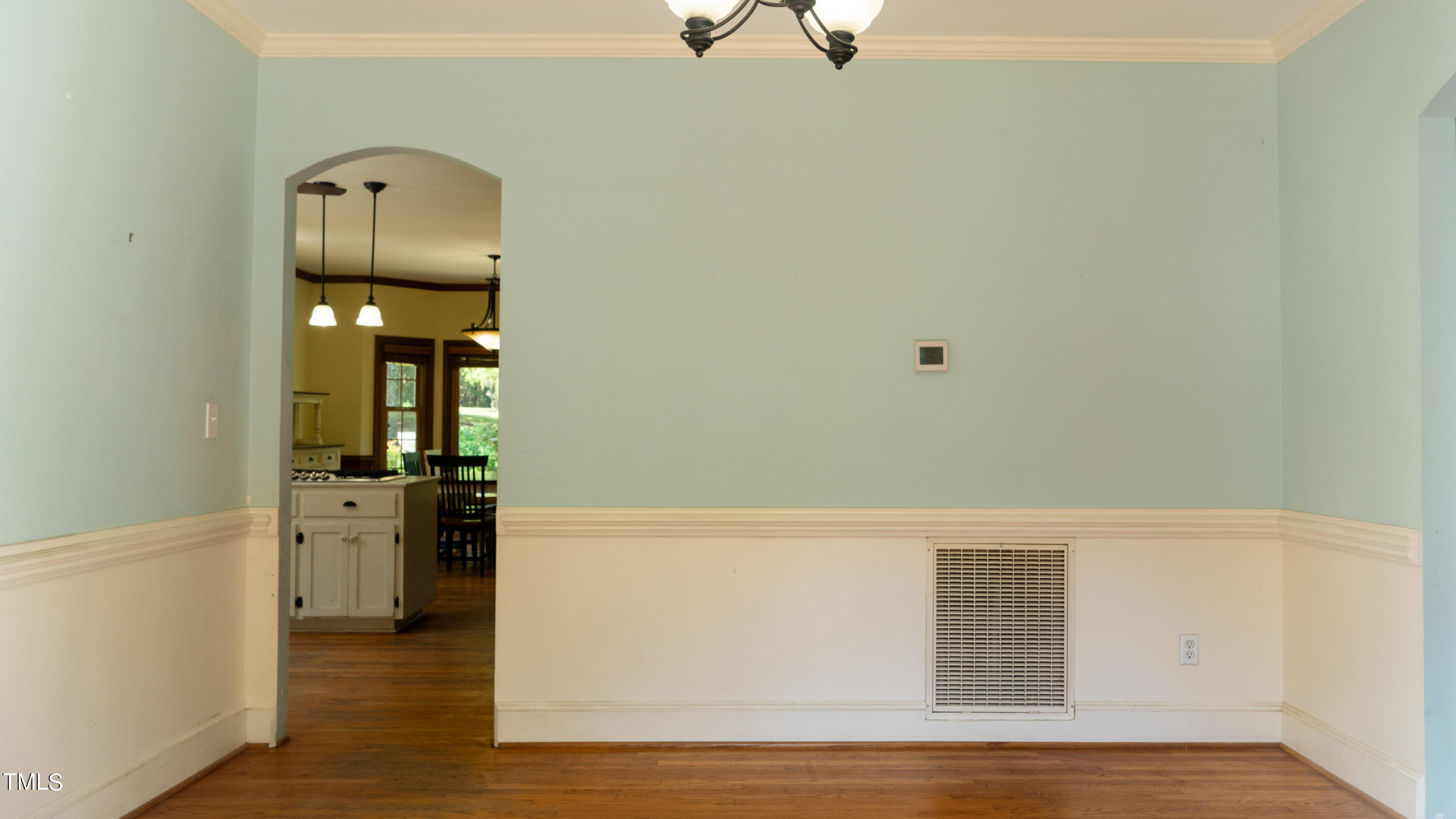 928 Windrow Lane Raleigh, NC 27603 - Photo 23 of 47 a view of a kitchen cabinets and wooden floor