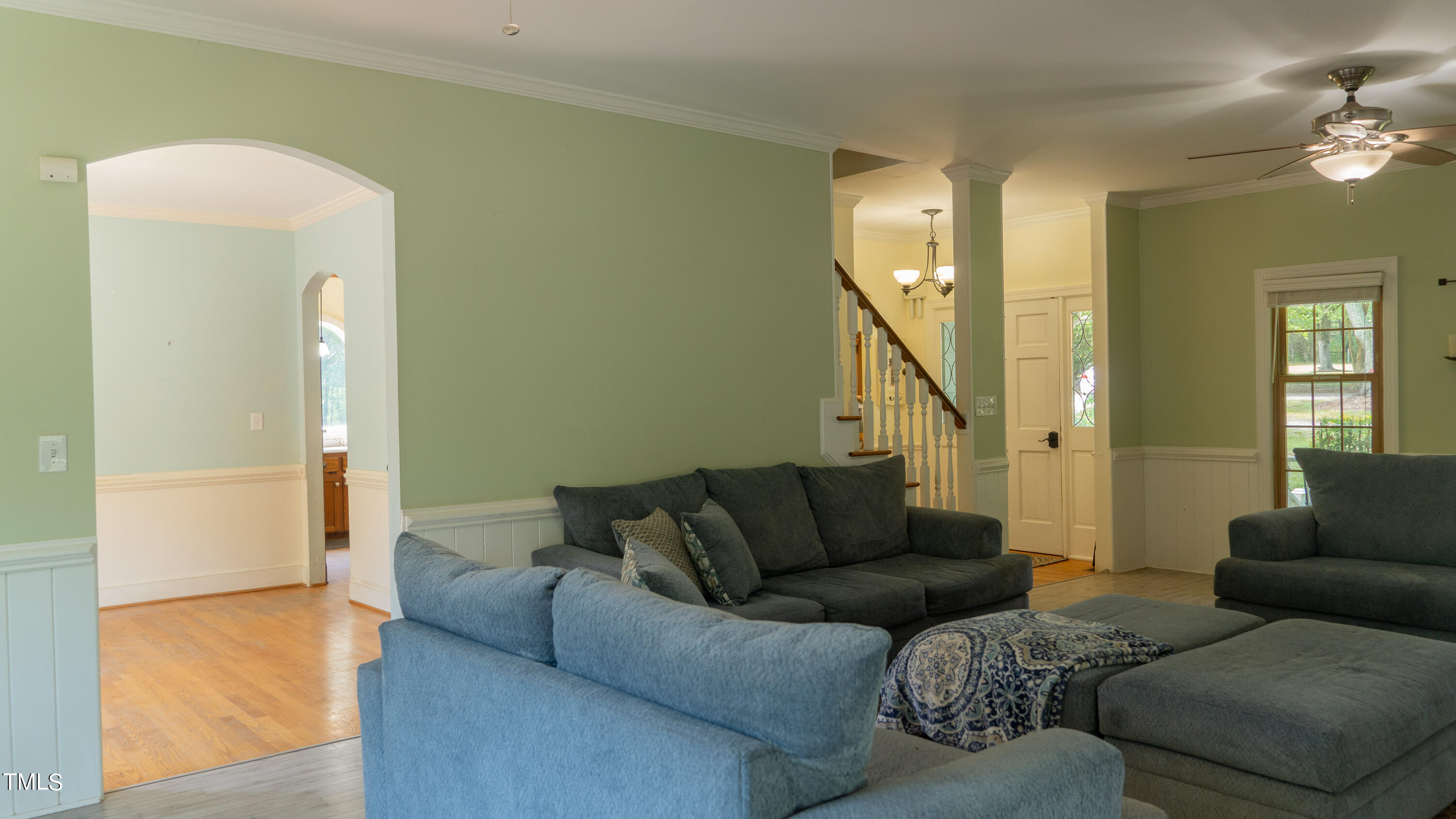 928 Windrow Lane Raleigh, NC 27603 - Photo 27 of 47 a living room with furniture and a couch
