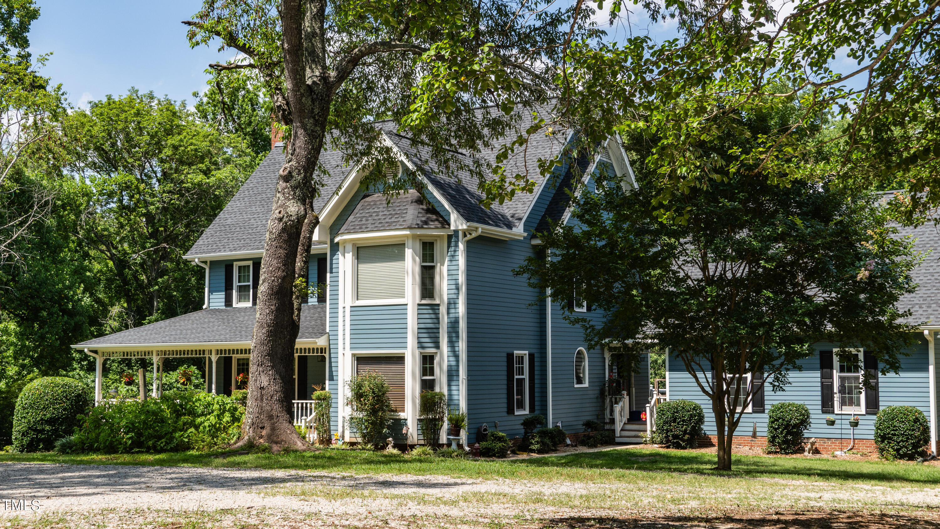 928 Windrow Lane Raleigh, NC 27603 - Photo 3 of 47 a front view of a house with a yard