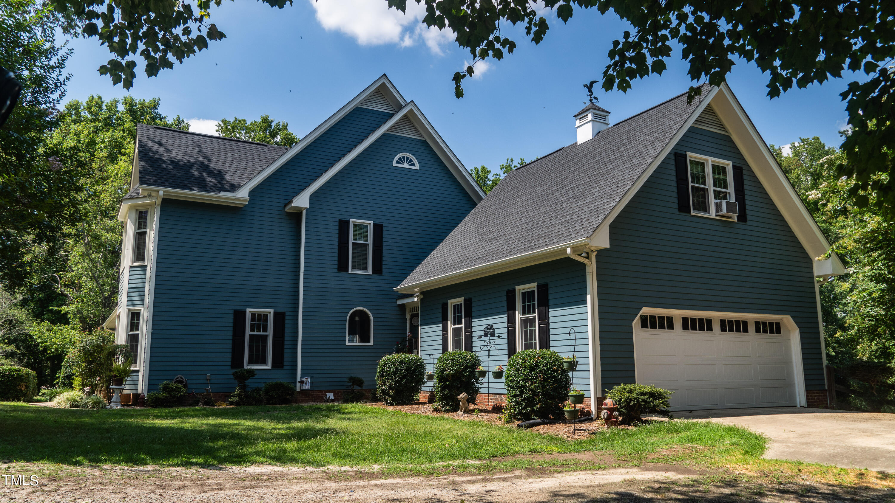 928 Windrow Lane Raleigh, NC 27603 - Photo 4 of 47 front view of a house with a yard