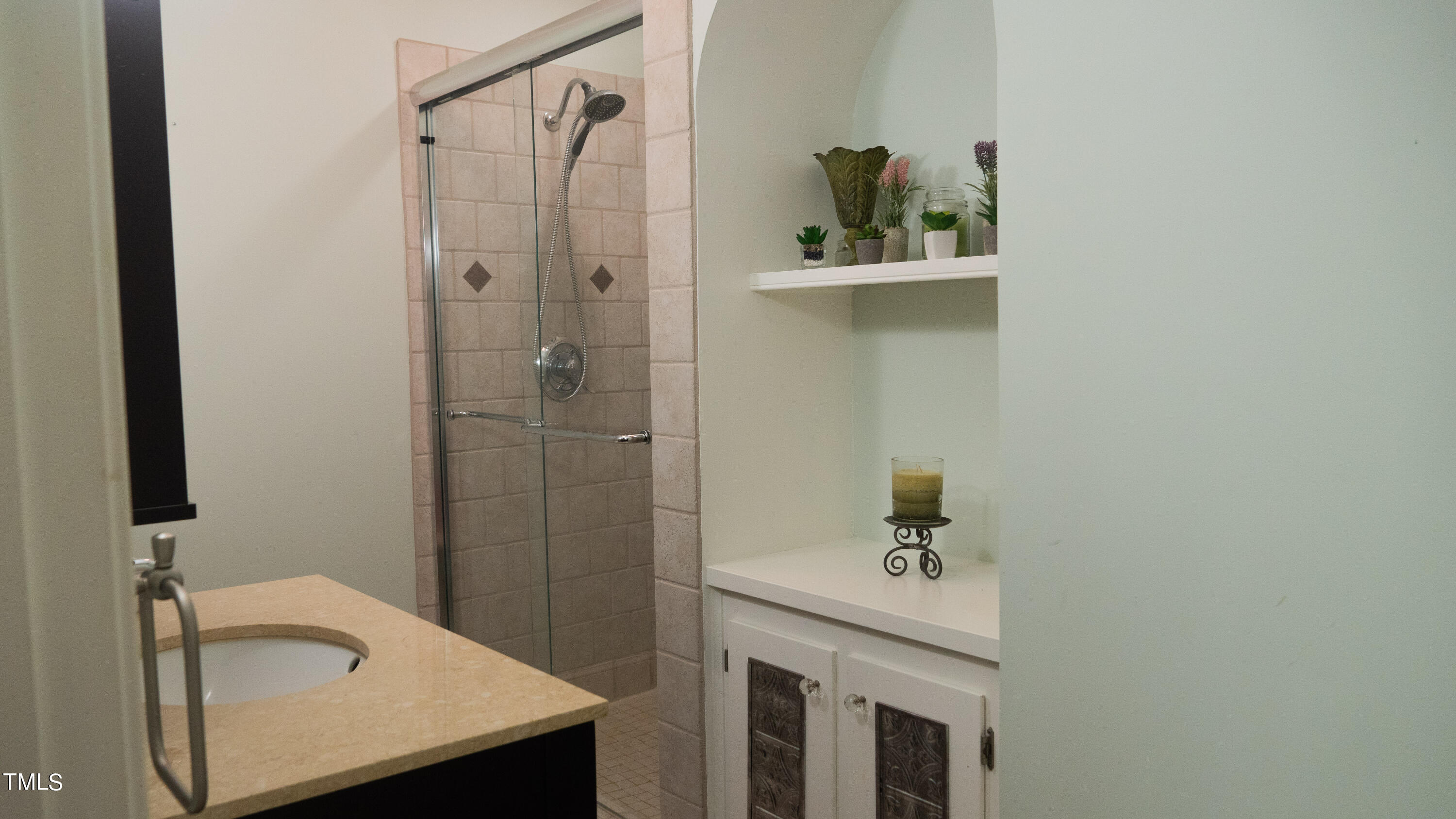 928 Windrow Lane Raleigh, NC 27603 - Photo 41 of 47 a bathroom with a sink a toilet and shower
