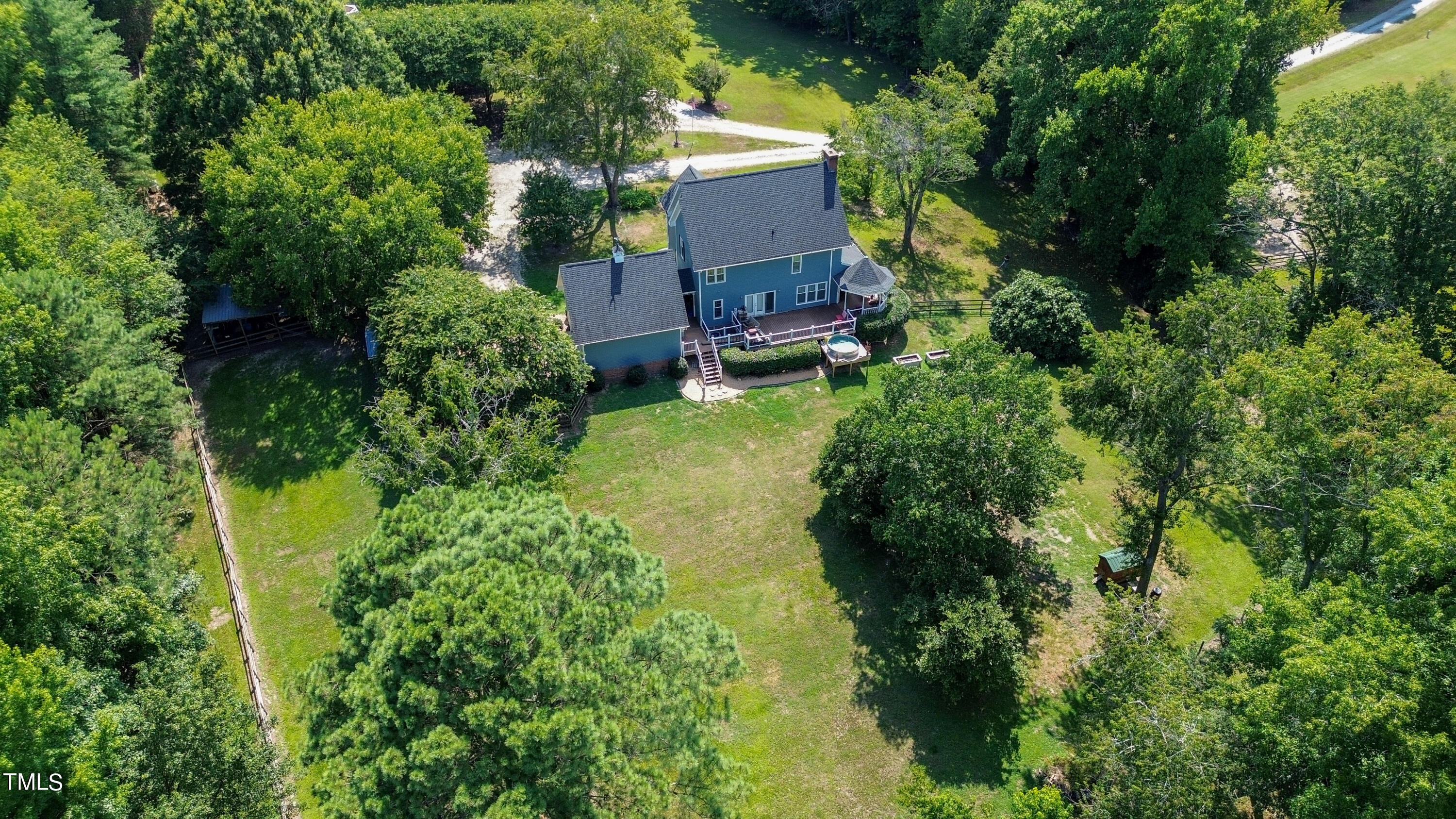 928 Windrow Lane Raleigh, NC 27603 - Photo 44 of 47 an aerial view of a house with a yard and swimming pool