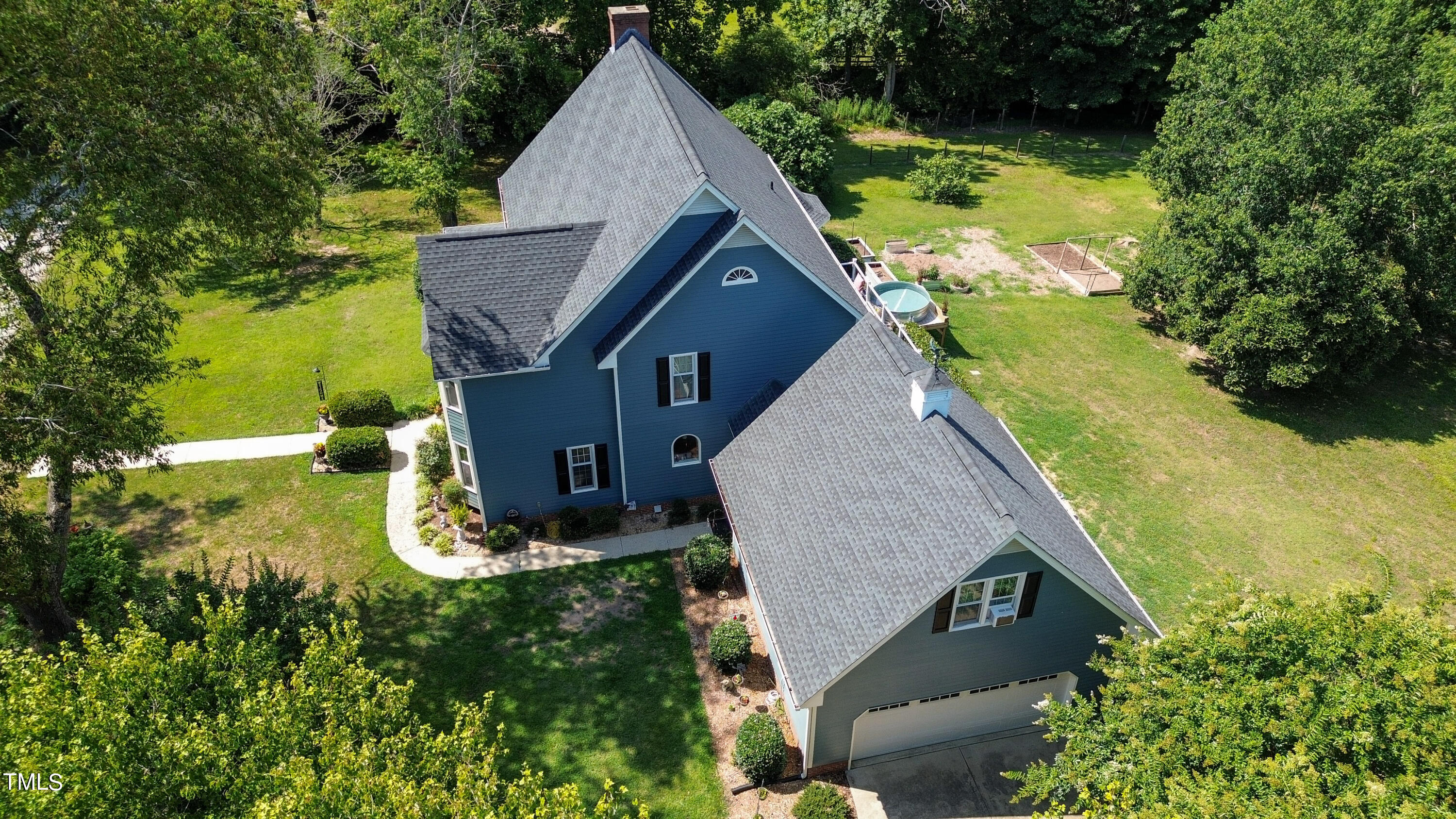 928 Windrow Lane Raleigh, NC 27603 - Photo 45 of 47 a aerial view of a house with a yard