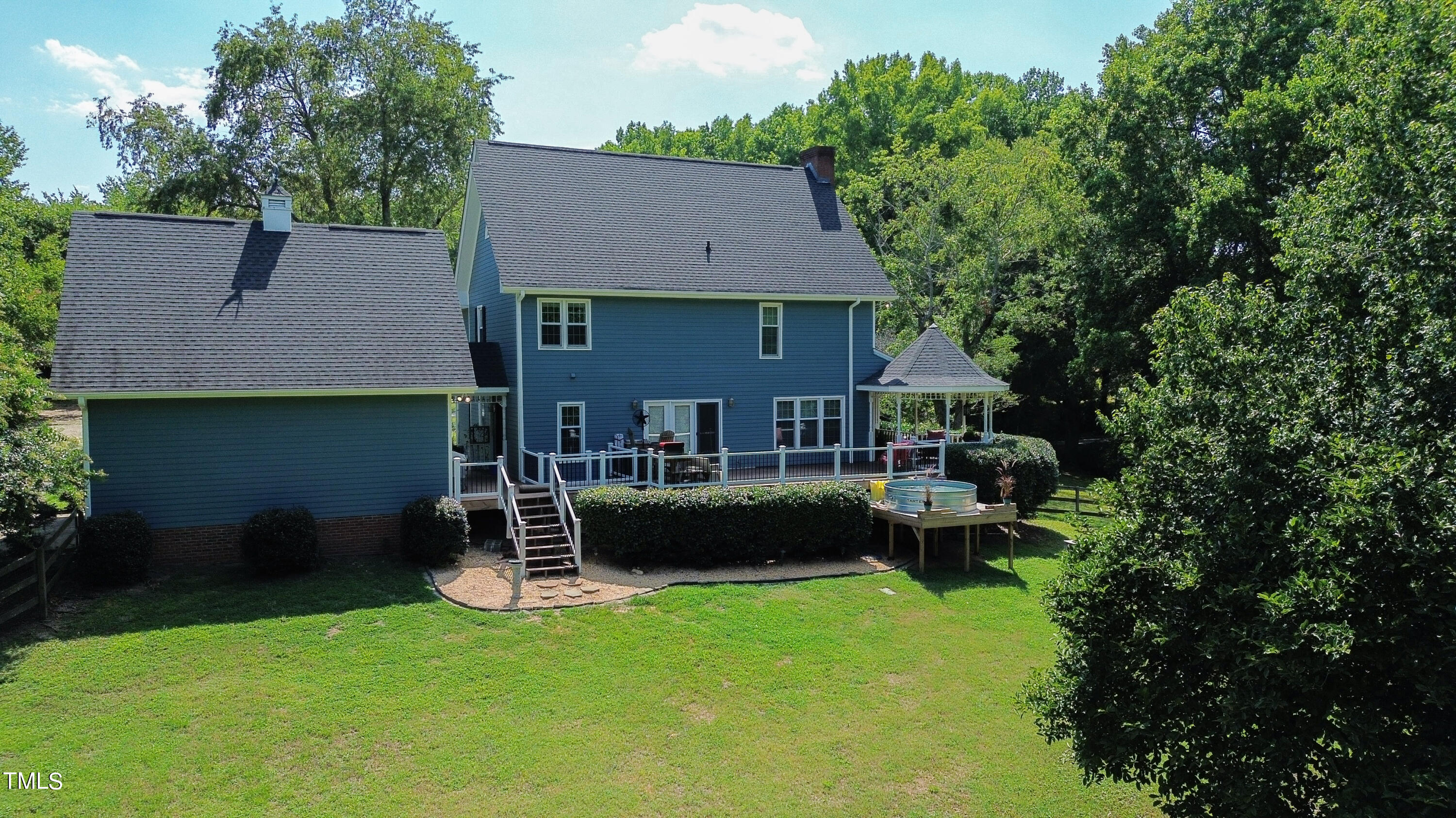928 Windrow Lane Raleigh, NC 27603 - Photo 46 of 47 an aerial view of a house with a yard patio and furniture