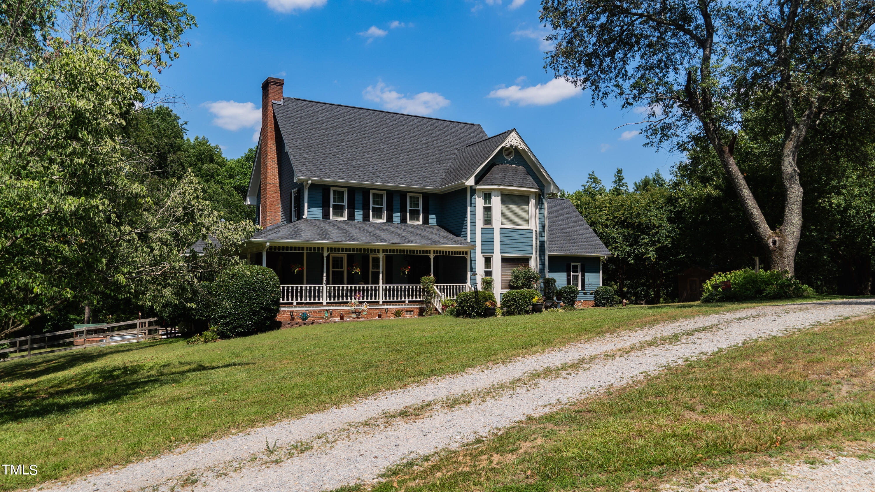 928 Windrow Lane Raleigh, NC 27603 - Photo 6 of 47 a front view of a house with a yard