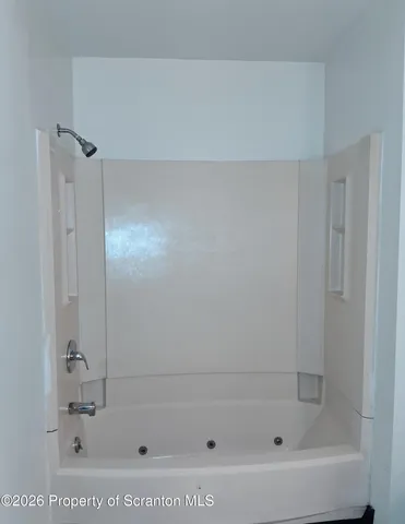 a open kitchen with stainless steel appliances kitchen island granite countertop a sink and cabinets