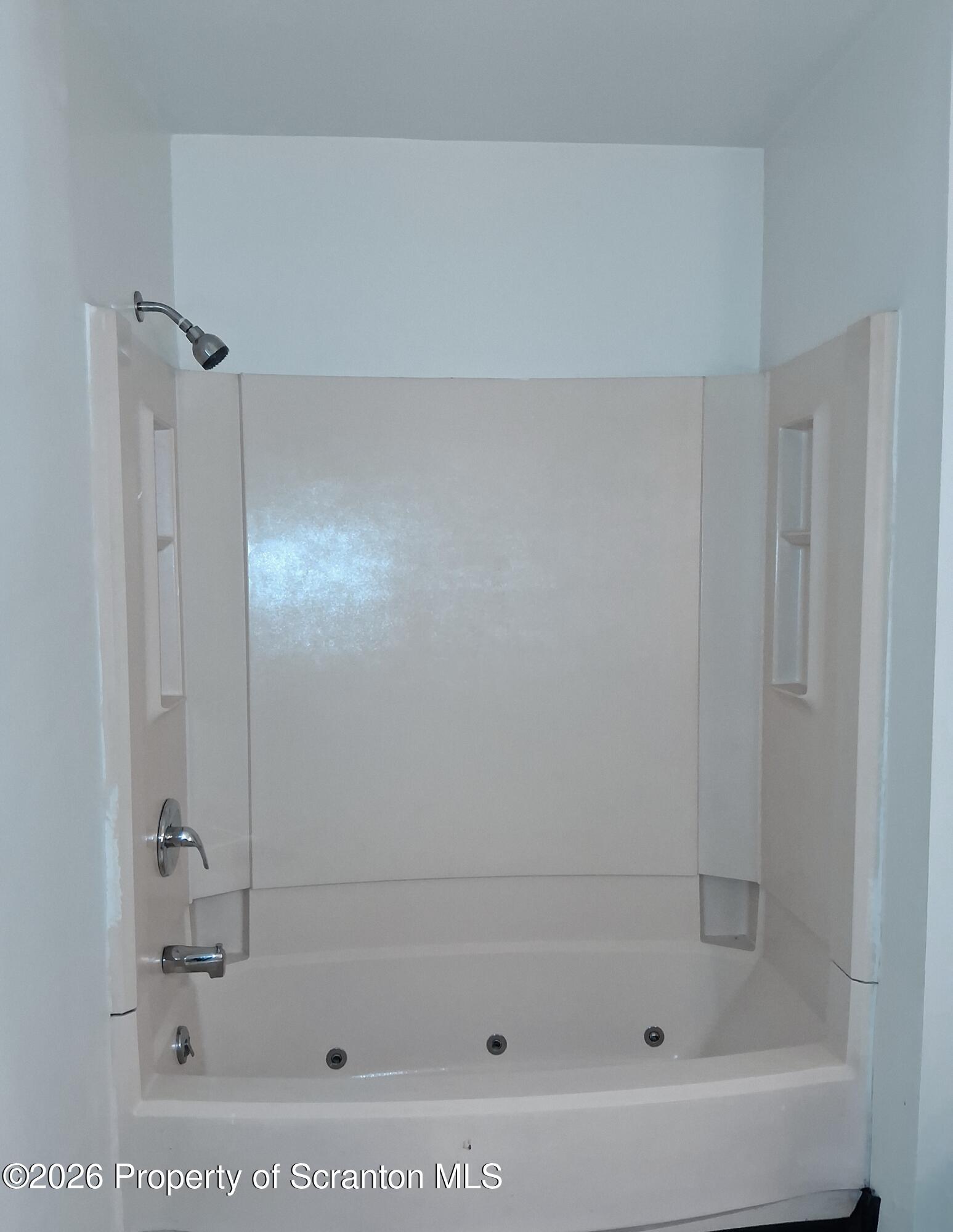 128 Meadow View Court Bushkill, PA 18324 - Photo 9 of 18 a bathroom with a bathtub