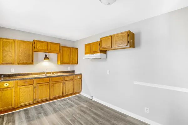 a bathroom with a sink and a window
