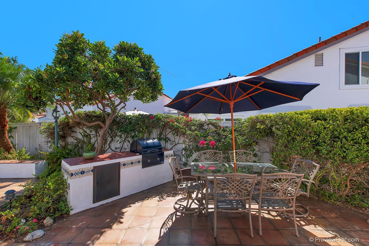 4173 Rhodes Way Oceanside, CA 92056 - Photo 3 of 25 Built-in gas BBQ with storage space & electrical outlets.