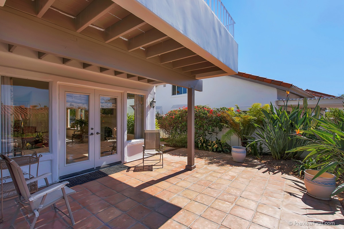 4173 Rhodes Way Oceanside, CA 92056 - Photo 4 of 25 Peaceful, private back patio off of the living room.