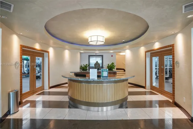 a room with dining table and entryway