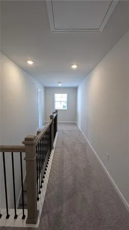 a view of hallway with stairs