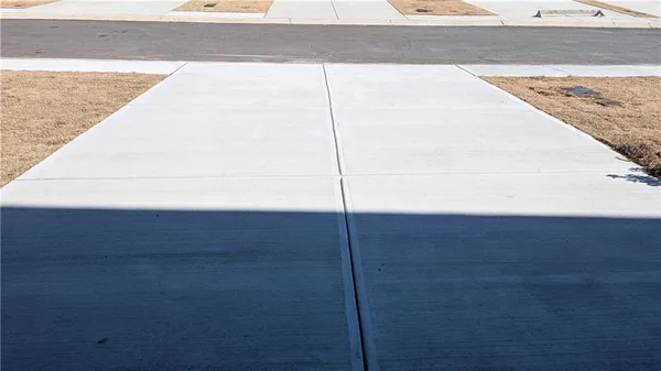 a view of a sink and wooden floor