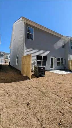 a view of a house with a snow in the yard
