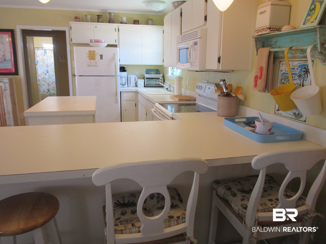 574 Our Road Gulf Shores, AL 36542 - Photo 12 of 32 Eating Bar to Kitchen