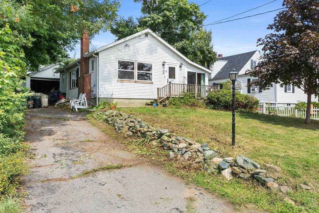 94 Gordon Road Braintree, MA 02184 - Photo 3 of 25 a view of a house with a yard