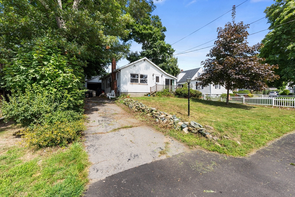 94 Gordon Road Braintree, MA 02184 - Photo 4 of 25 front view of a house with a yard