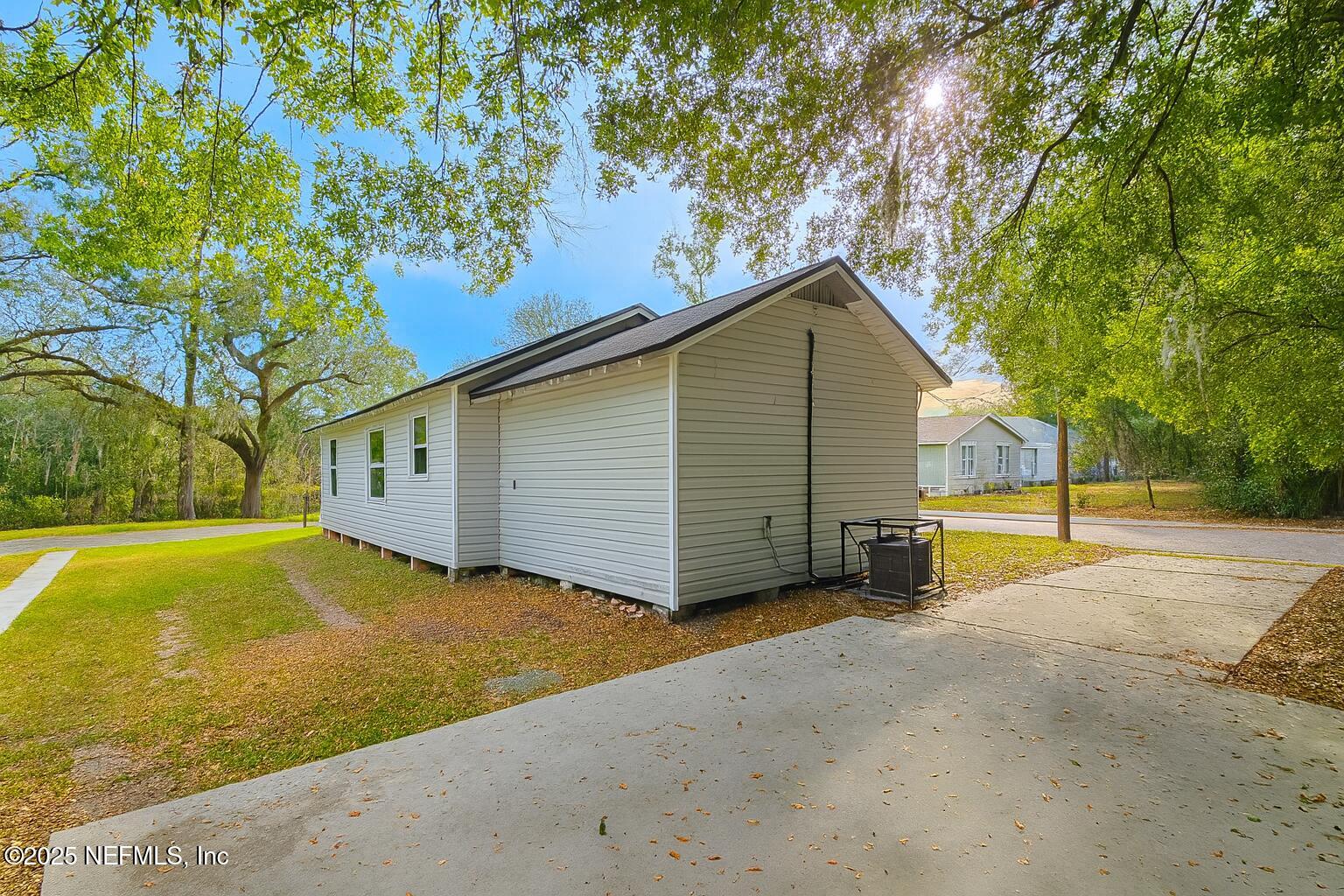 804 Westbrook Road Jacksonville, FL 32209 - Photo 17 of 23 a view of a house with a backyard