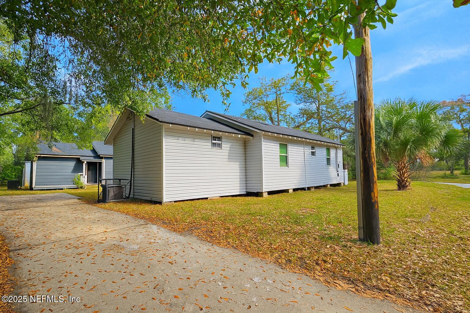 804 Westbrook Road Jacksonville, FL 32209 - Photo 18 of 23 a view of a house with a yard