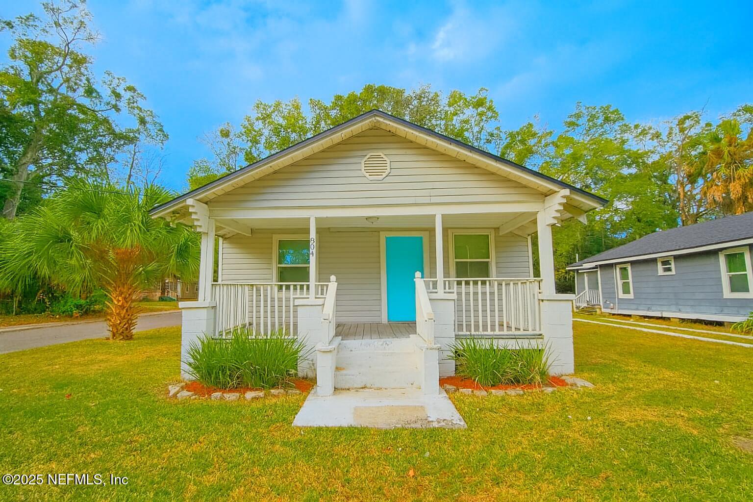 804 Westbrook Road Jacksonville, FL 32209 - Photo 20 of 23 a front view of a house with a yard