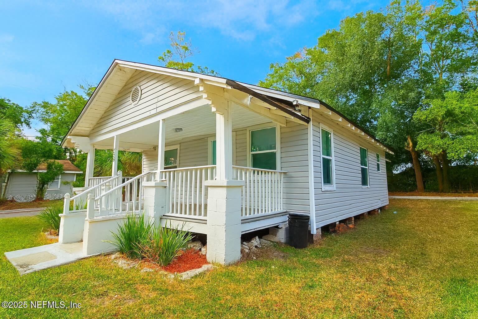 804 Westbrook Road Jacksonville, FL 32209 - Photo 22 of 23 a view of a house with a yard