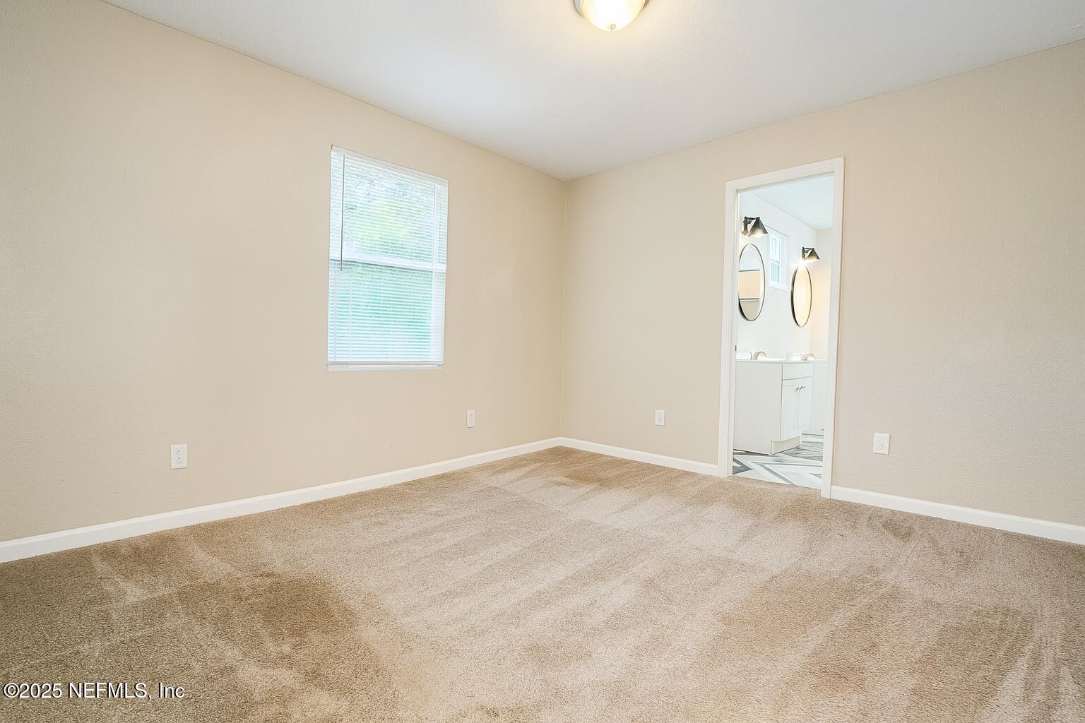 804 Westbrook Road Jacksonville, FL 32209 - Photo 8 of 23 an empty room with windows
