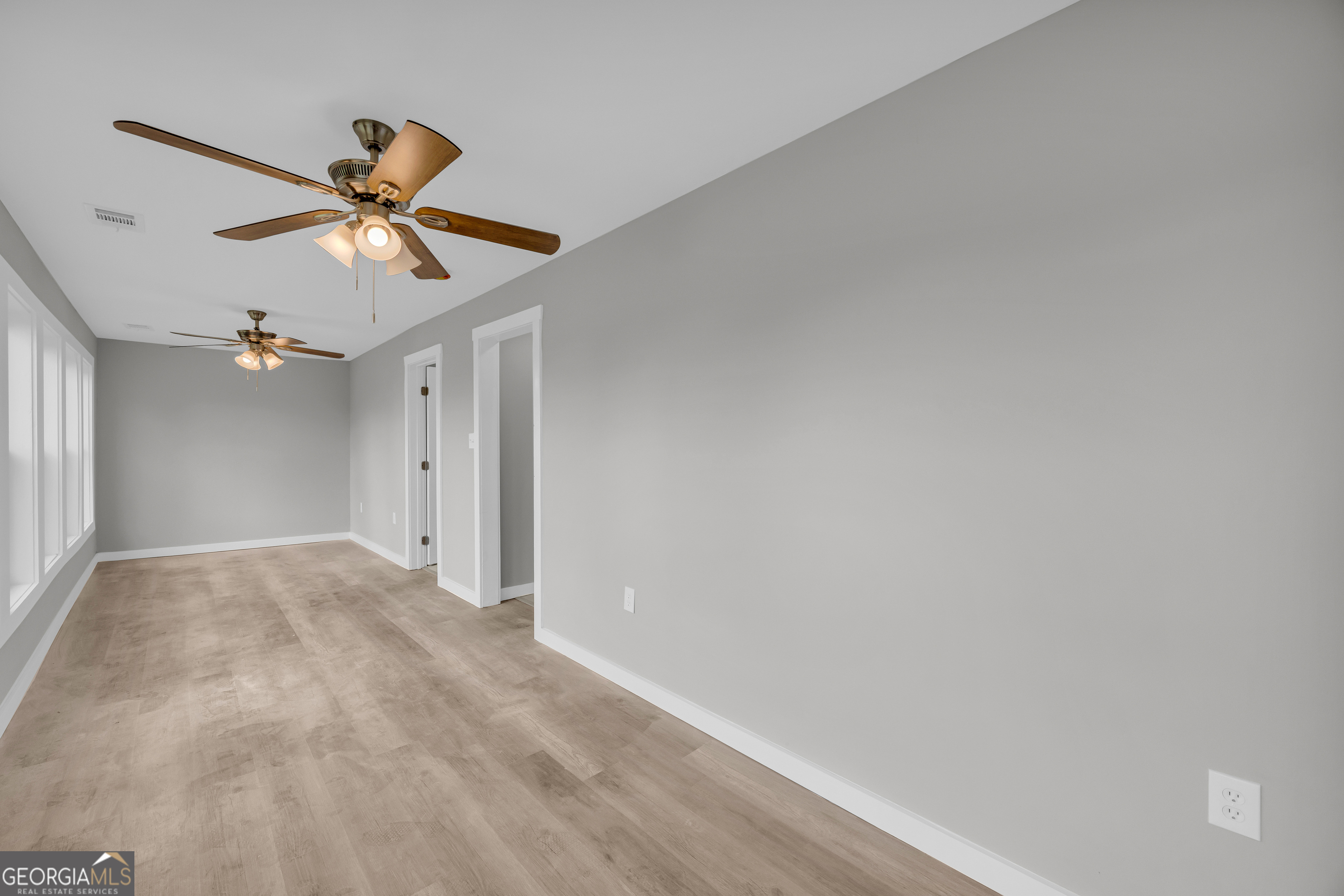 8606 Holly Springs Road Maysville, GA 30558 - Photo 59 of 74 a view of a big room with carpet
