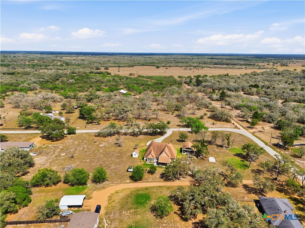 790 Spanish Grant Road Goliad, TX 77963 - Photo 39 of 41 an aerial view of residential building and lake