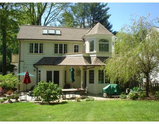 35 Terrace Avenue Riverside, CT 06878 - Photo 2 of 10 a front view of a house with a yard and trees