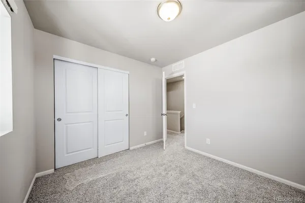 a view of hallway with natural light