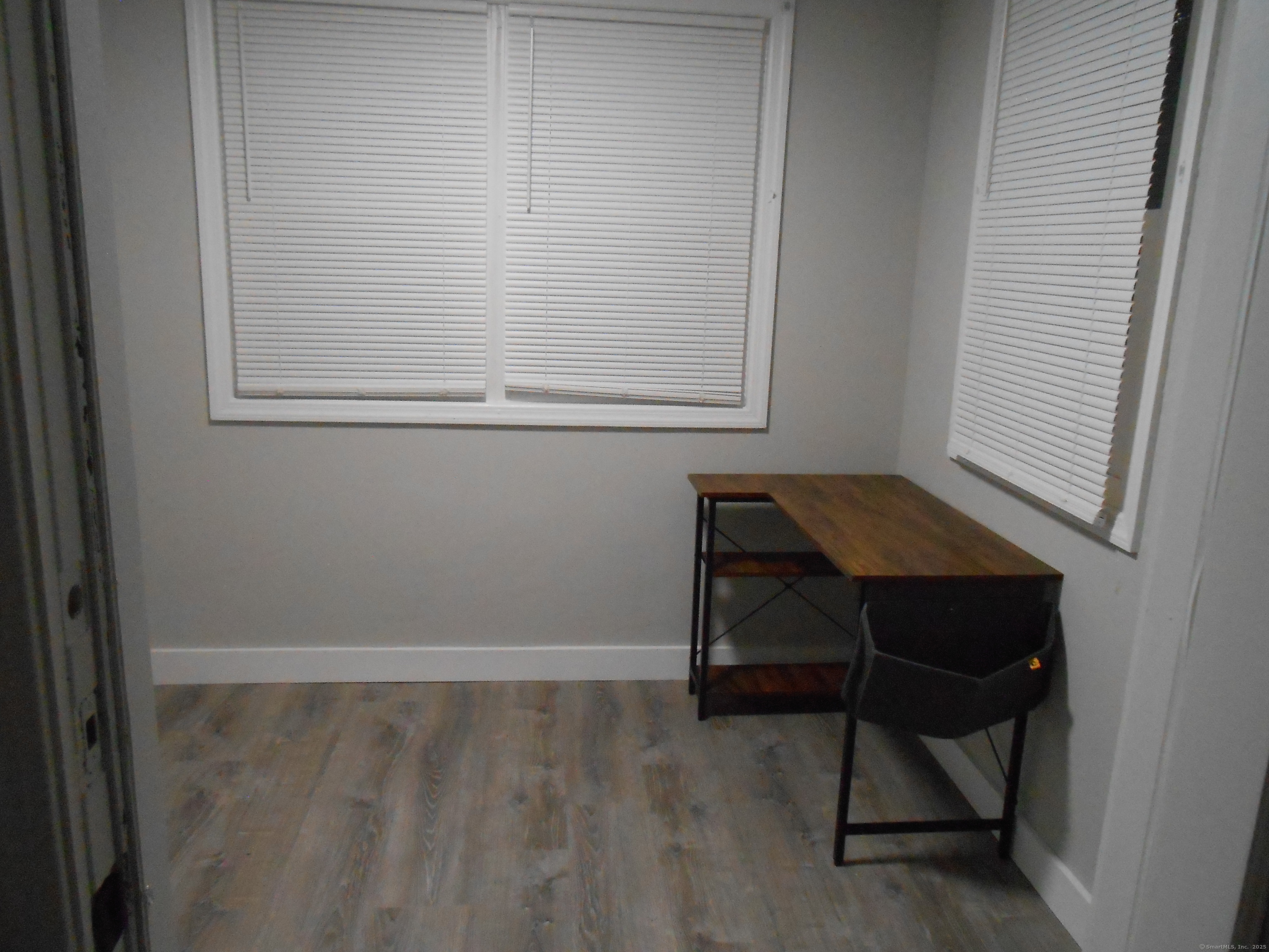 631 Whalley Avenue New Haven, CT 06511 - Photo 17 of 28 a room that has a dresser and a chair in it