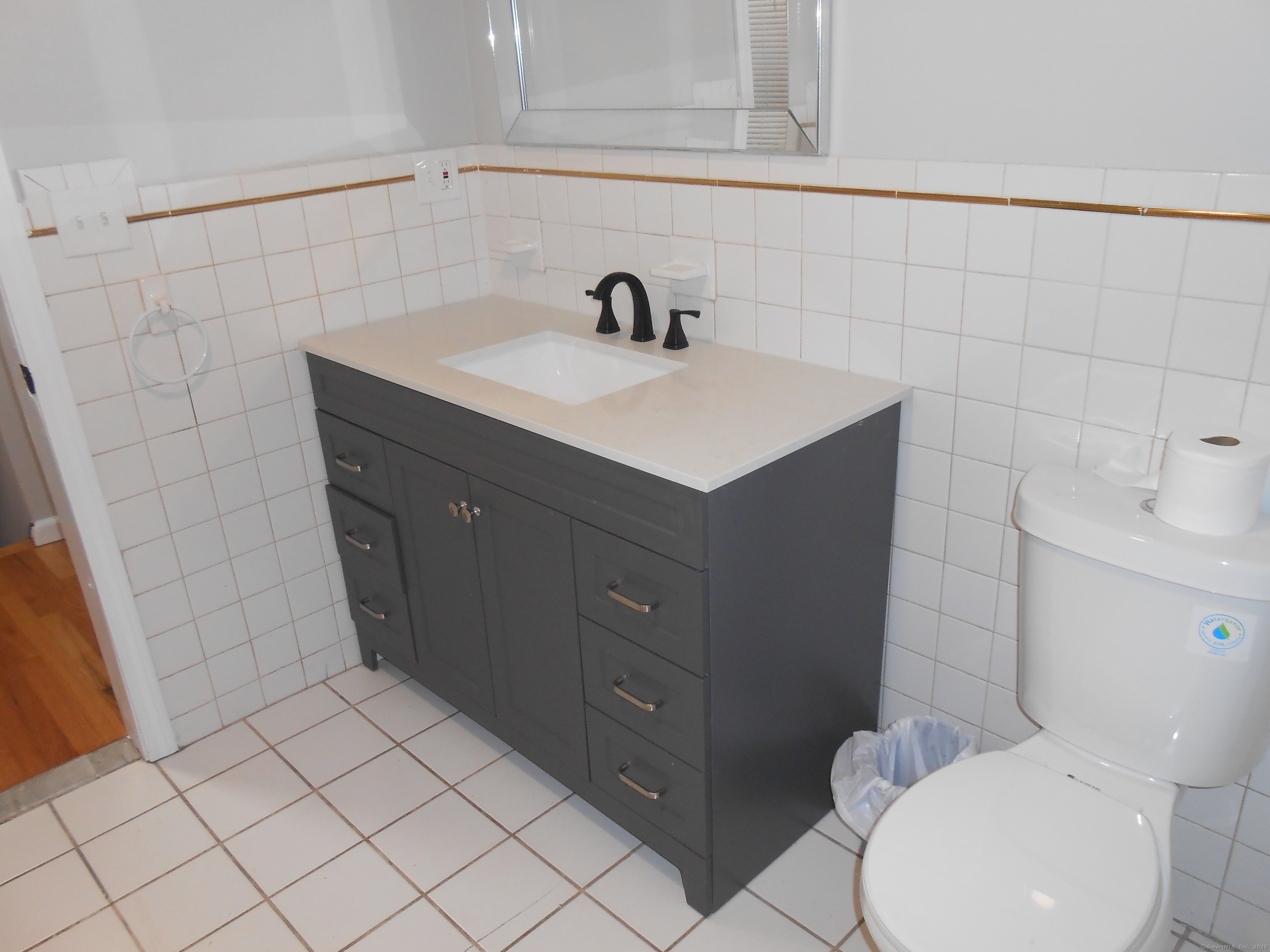 631 Whalley Avenue New Haven, CT 06511 - Photo 26 of 28 a bathroom with a sink vanity and toilet