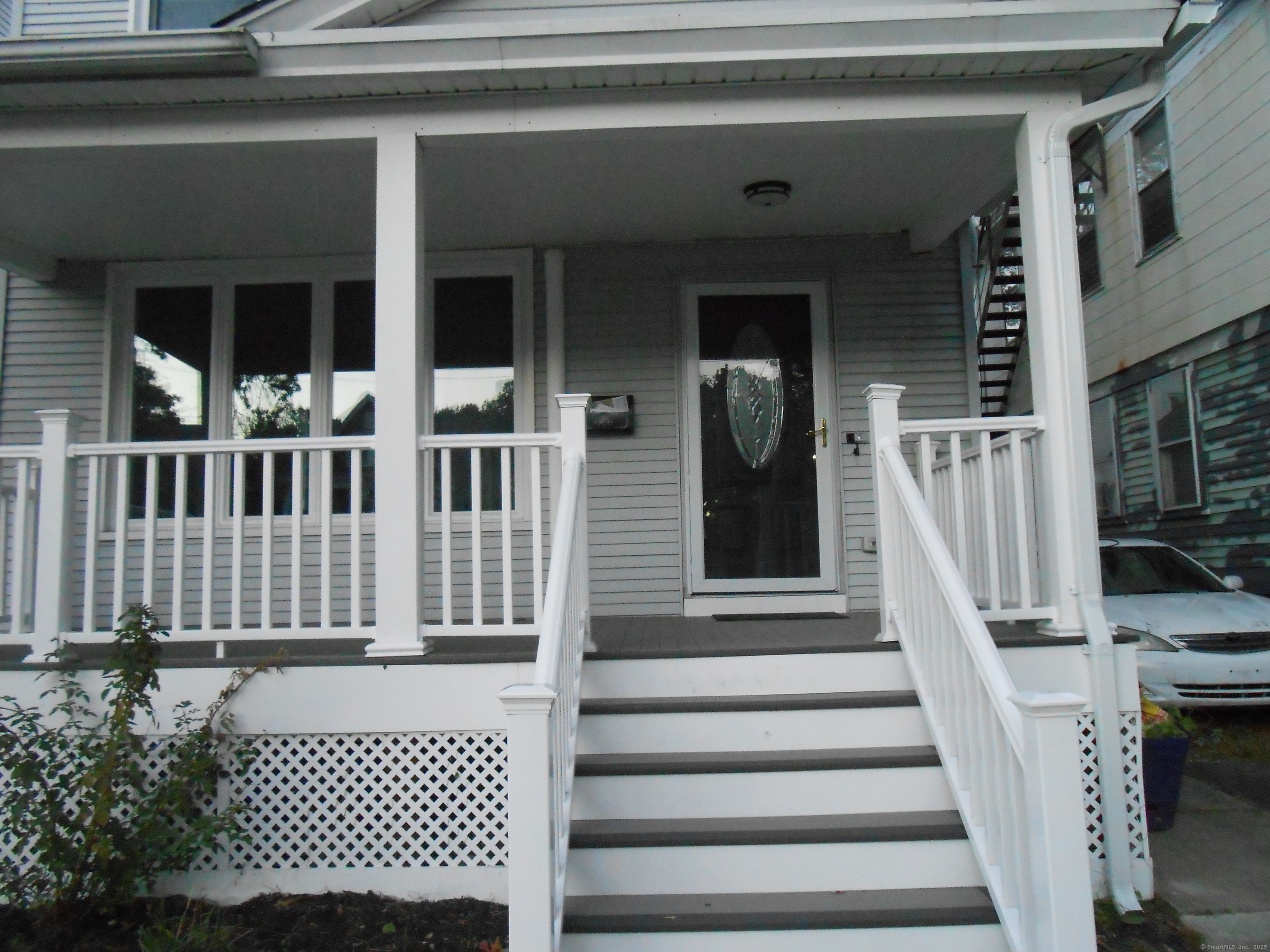 631 Whalley Avenue New Haven, CT 06511 - Photo 3 of 28 a view of a house with wooden deck