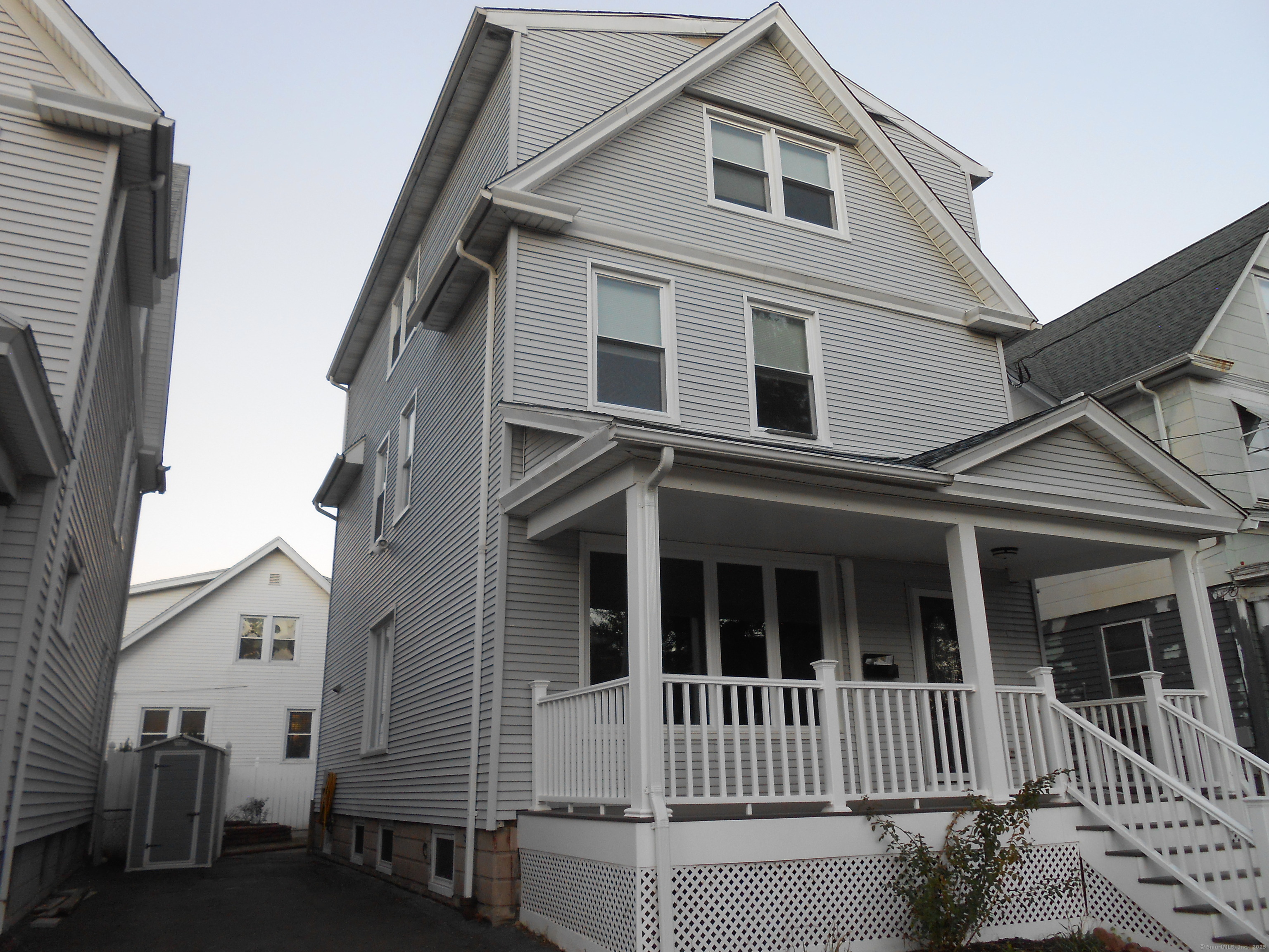 631 Whalley Avenue New Haven, CT 06511 - Photo 6 of 28 a view of a house with a porch