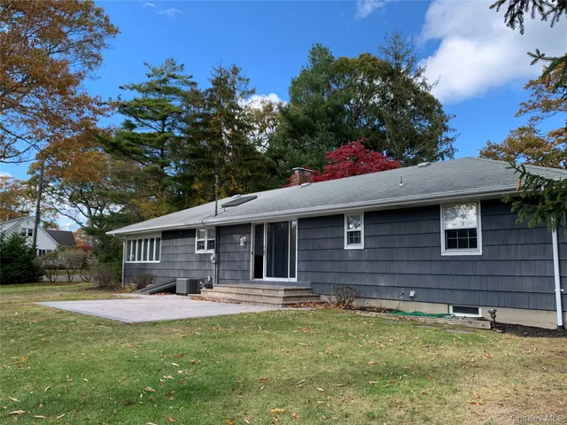 a front view of a house with swimming pool