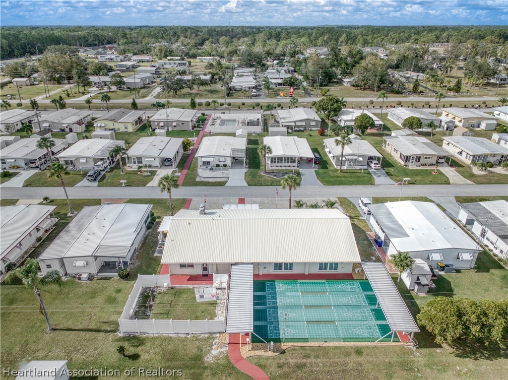 2702 Rodney Street Sebring, FL 33872 - Photo 33 of 33 an aerial view of residential houses with outdoor space