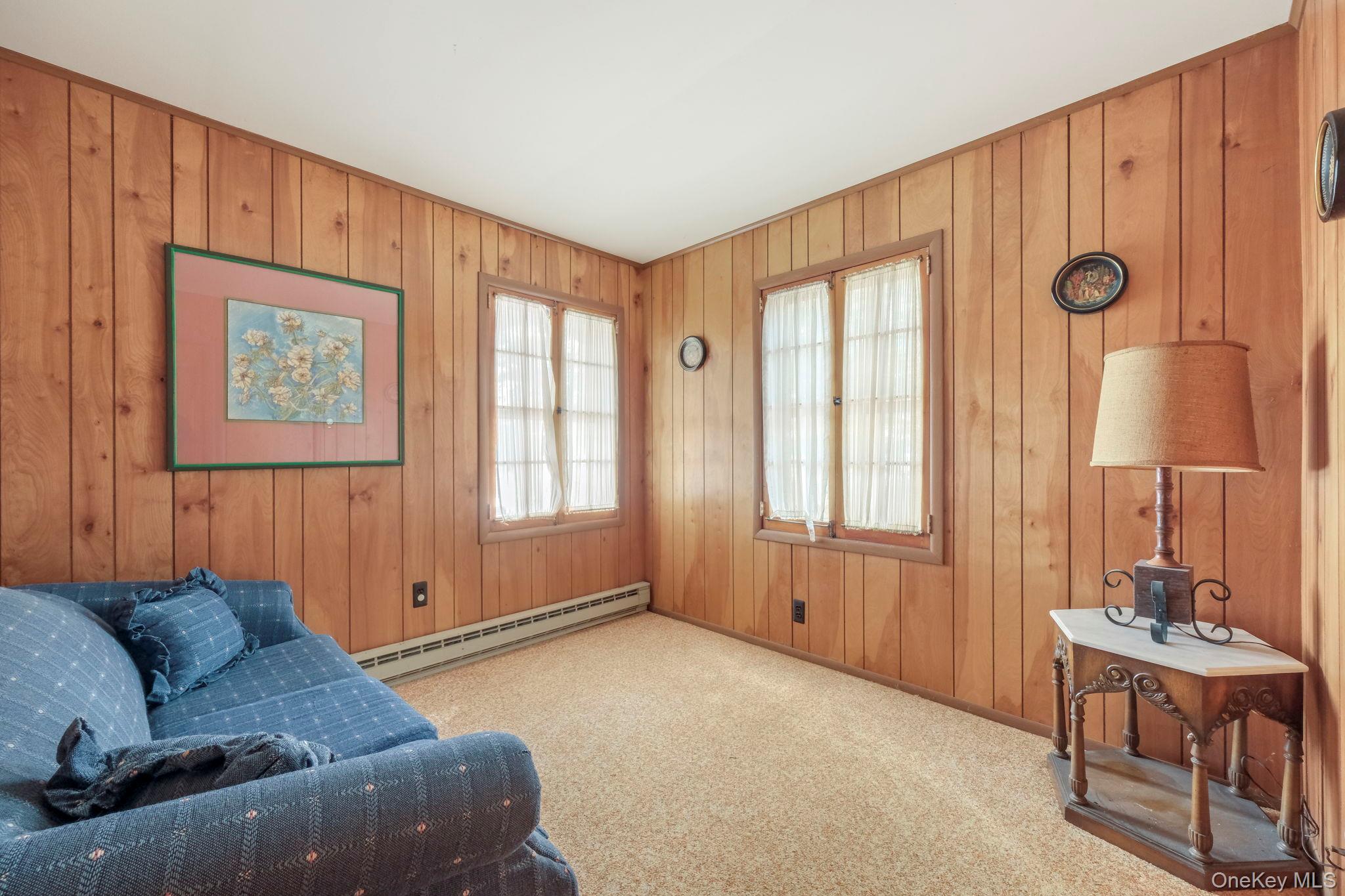 194 Canal Road Wurtsboro, NY 12790 - Photo 22 of 43 a living room with furniture and a window
