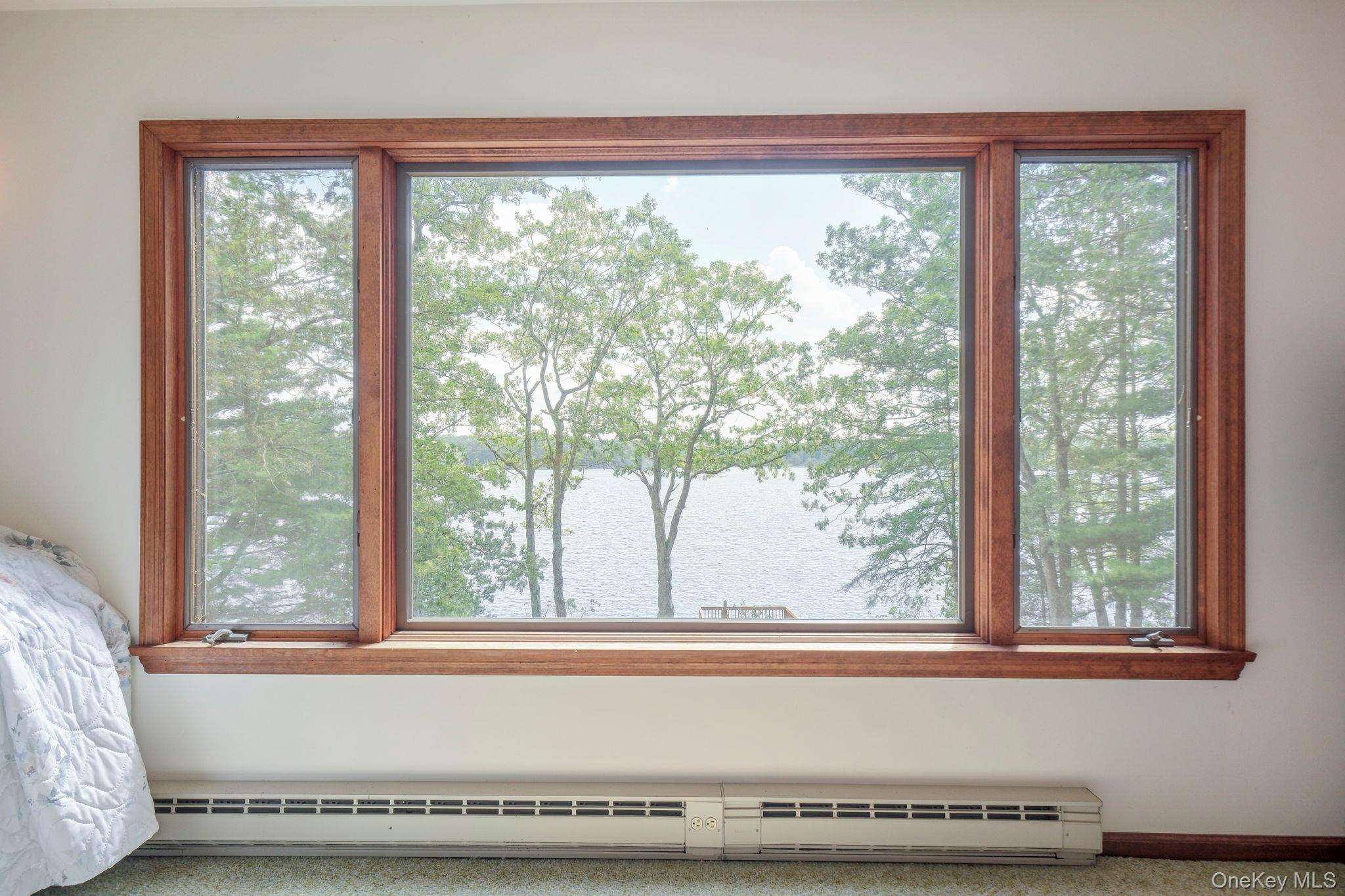 194 Canal Road Wurtsboro, NY 12790 - Photo 26 of 43 a view of a bath tub sitting in front of a window
