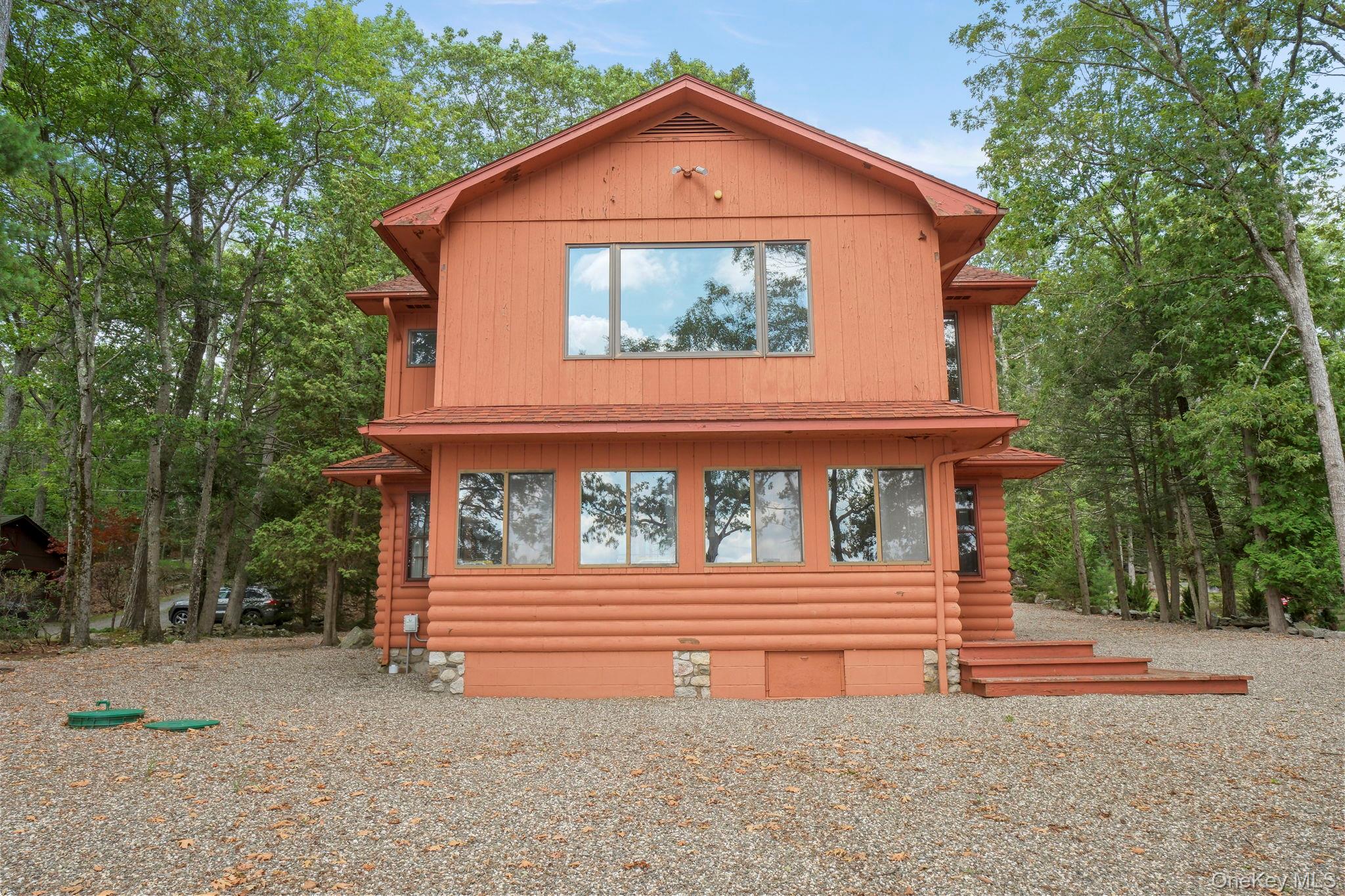 194 Canal Road Wurtsboro, NY 12790 - Photo 5 of 43 a view of a house with a small yard