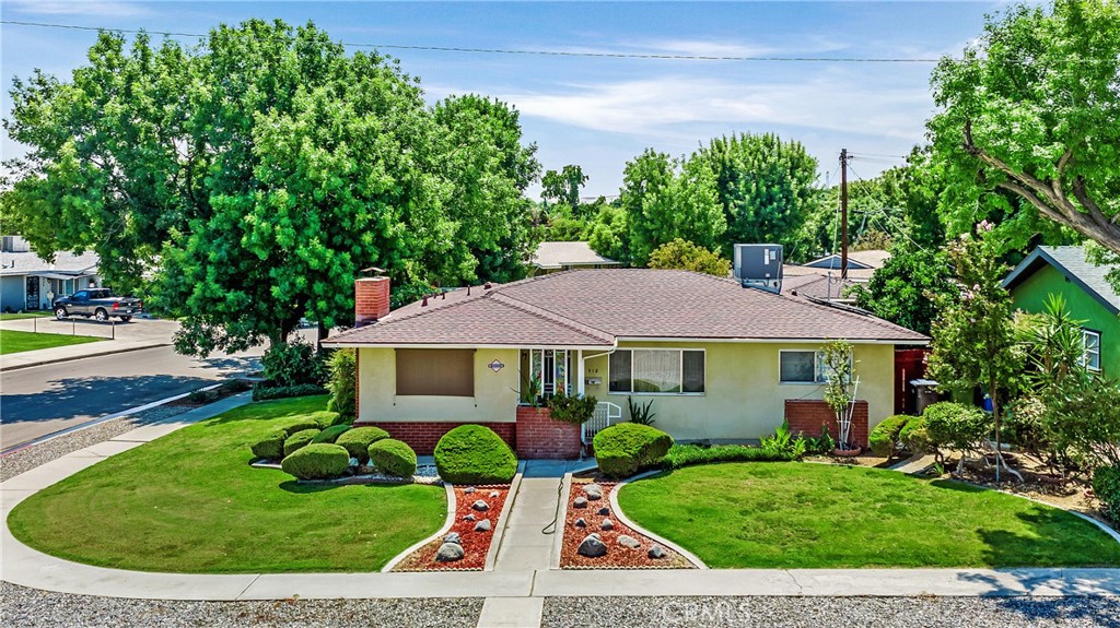 918 2nd Street Taft, CA 93268 - Photo 1 of 1 a front view of a house with a yard