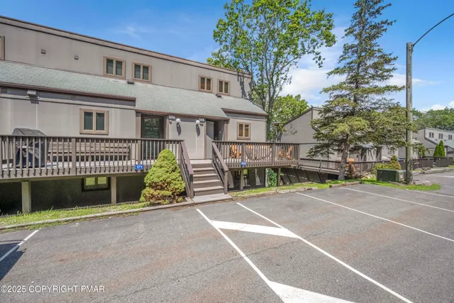 a view of a house with a garden