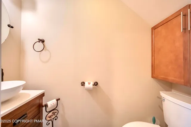 a room with furniture and a refrigerator