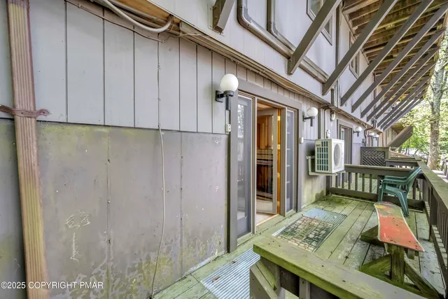 a kitchen with a refrigerator a stove top oven and a refrigerator