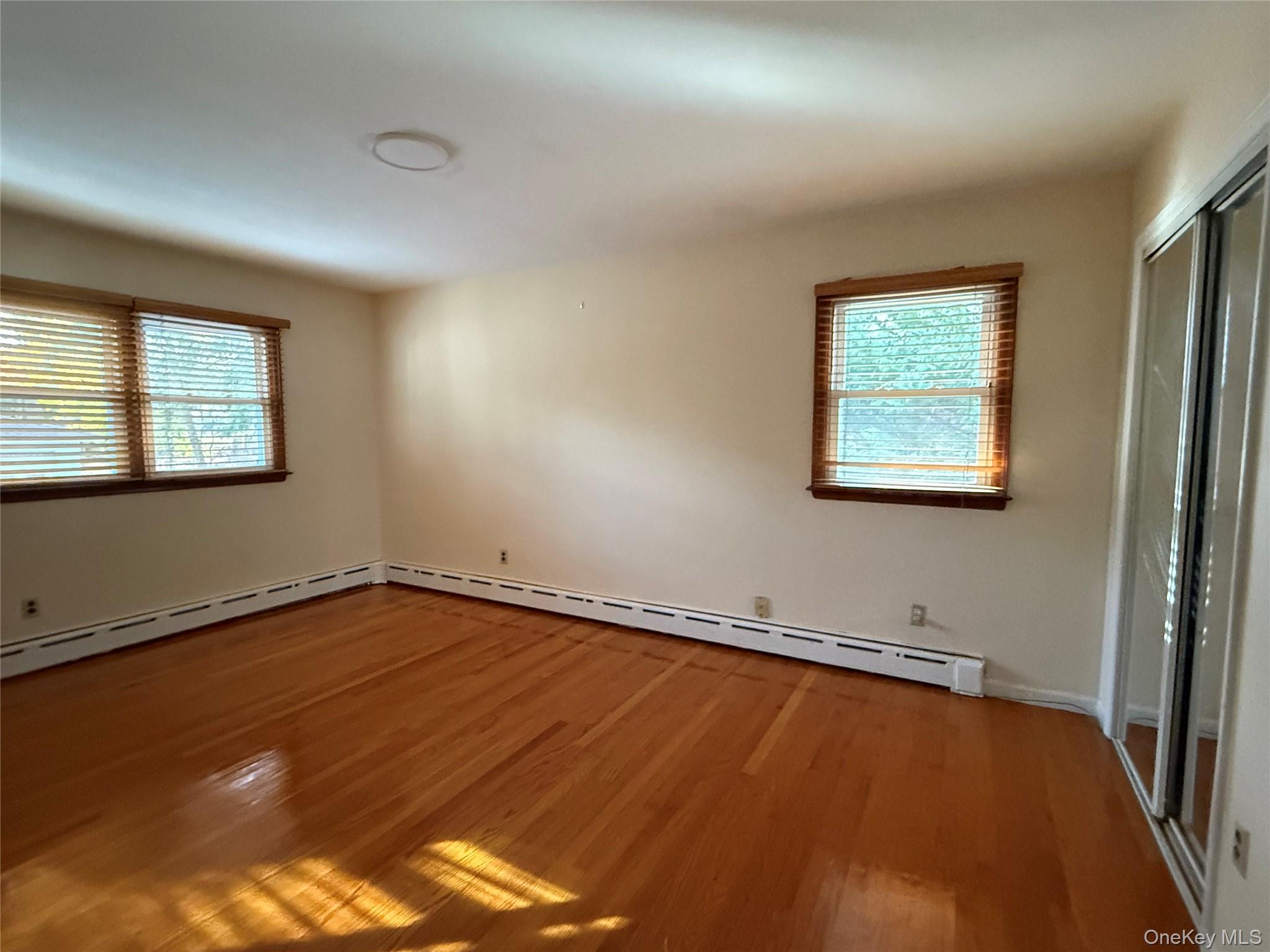 10 Glenbrook Road Monsey, NY 10952 - Photo 11 of 16 a view of a room with wooden floor and window