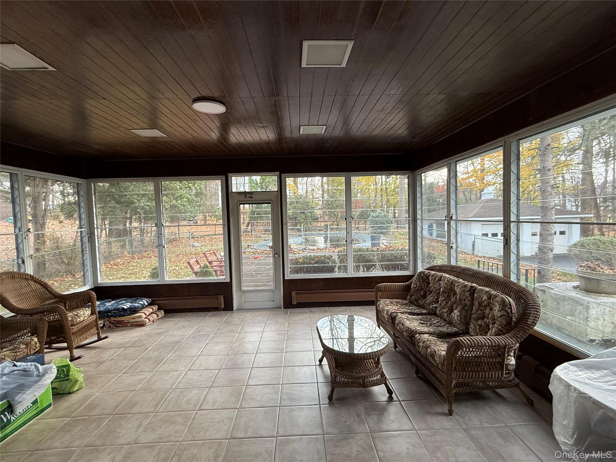 10 Glenbrook Road Monsey, NY 10952 - Photo 12 of 16 a living room with furniture and floor to ceiling window