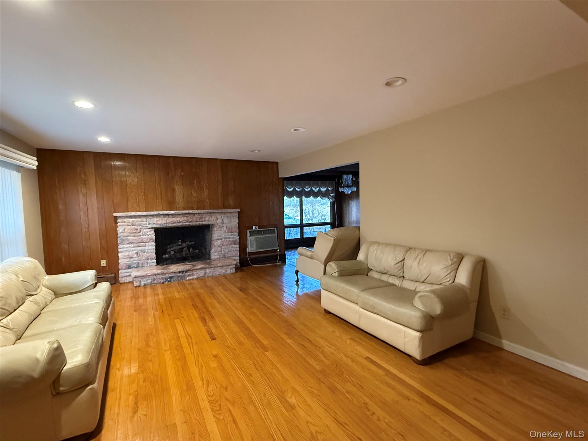 10 Glenbrook Road Monsey, NY 10952 - Photo 5 of 16 a living room with furniture and a fireplace