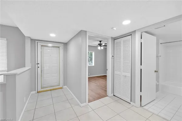 a view of entryway with white walls