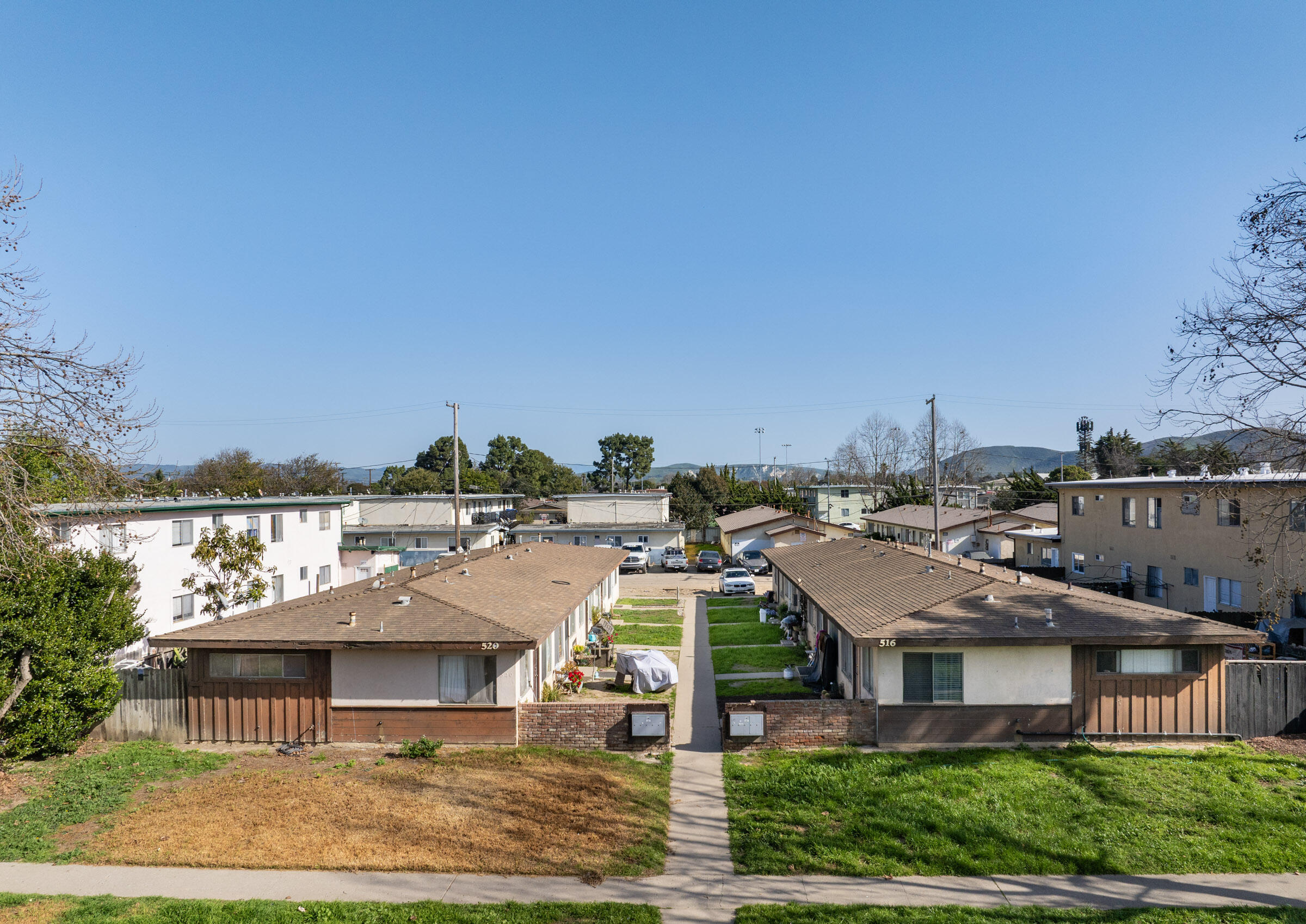 516 North U Street Lompoc, CA 93436 - Photo 5 of 8 a view of a house with a yard and sitting space
