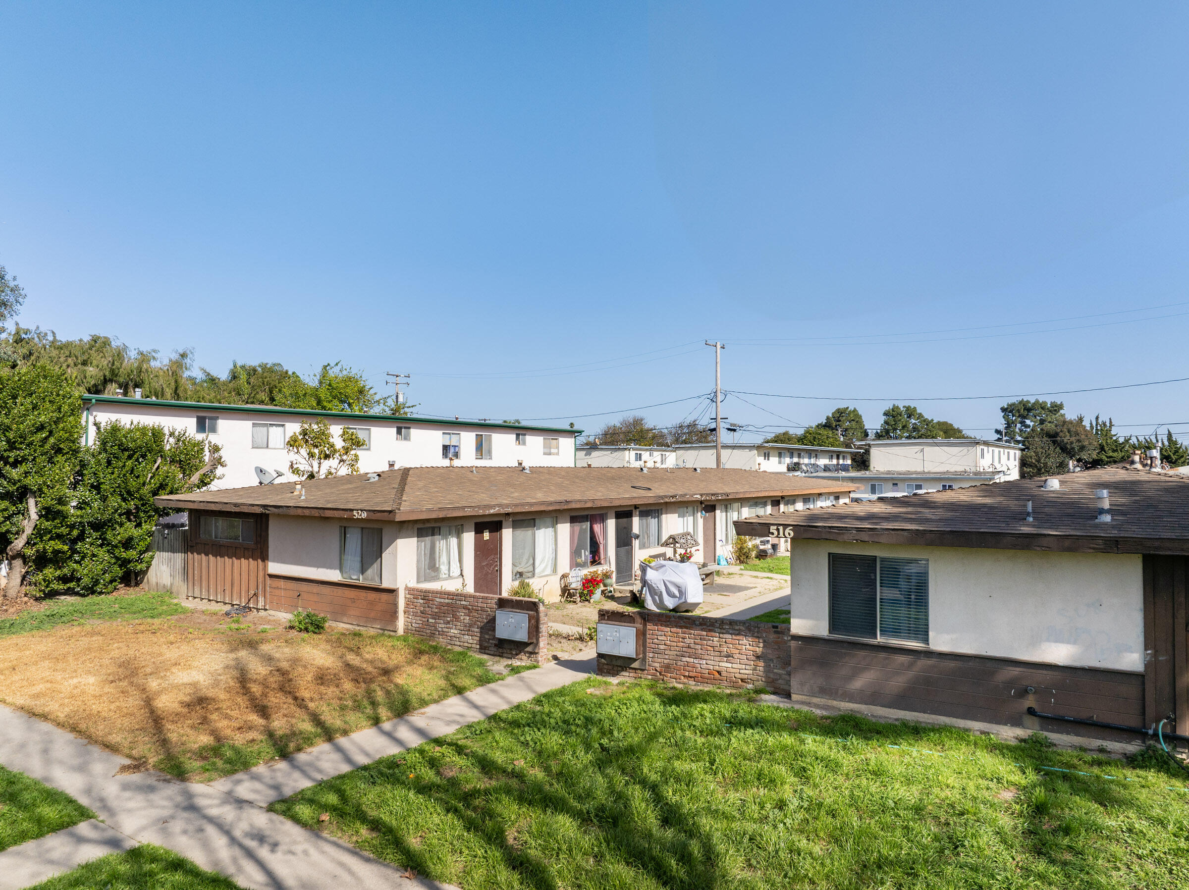 516 North U Street Lompoc, CA 93436 - Photo 6 of 8 front view of a house with a yard